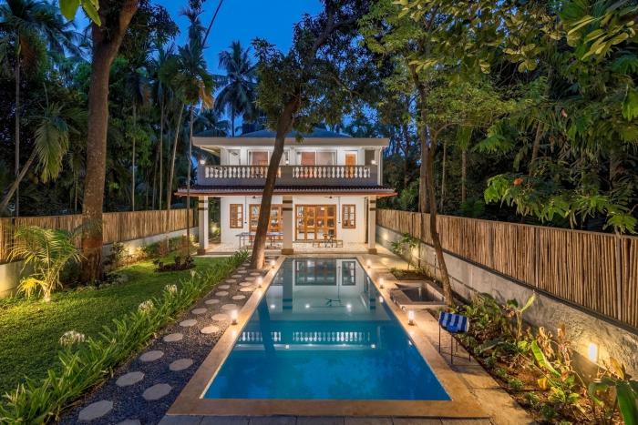 SaffronStays Atmos - 3BR rustic pool villa with projector screen, table tennis, carrom & cozy family spaces in Nagaon