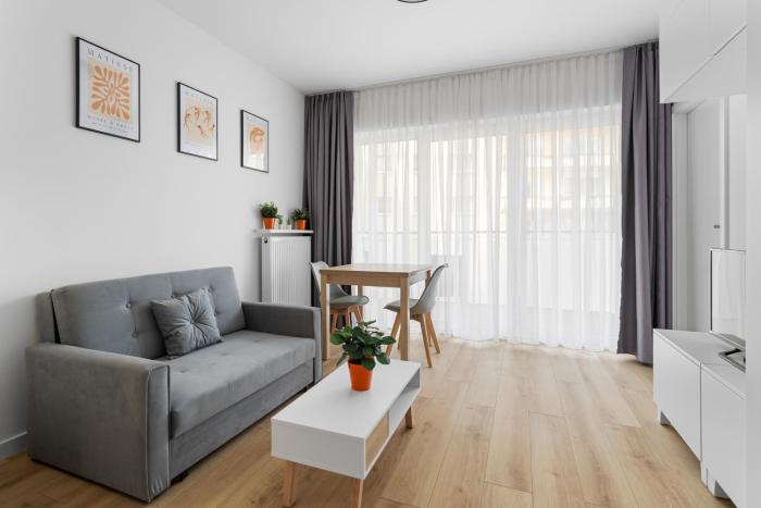 Nowoczesne i Eleganckie Studio oraz Apartament z Balkonami w Poznaniu by Noclegi Renters