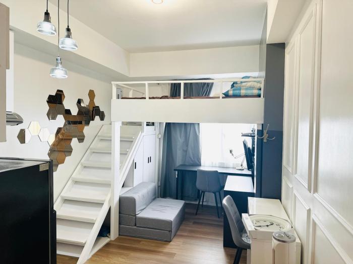 "Stylish Loft Condo with High-Speed WiFi at Avida Towers"