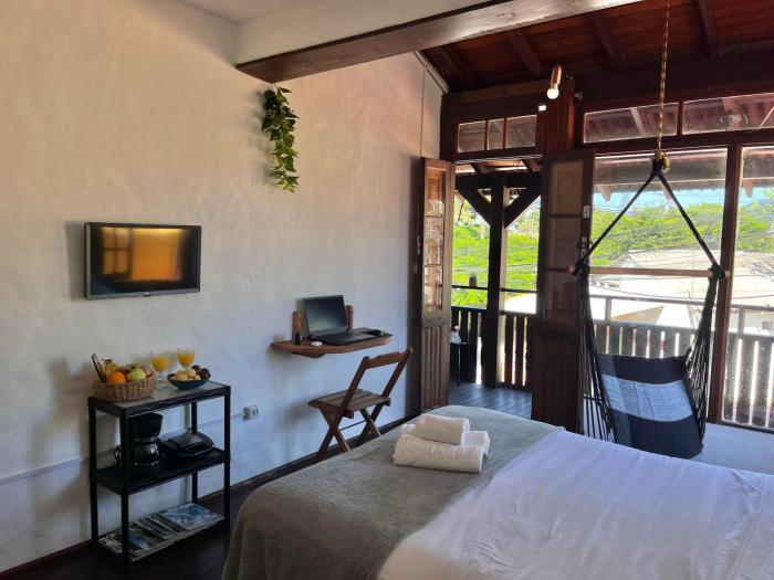 Espaço com Studios Rústicos na Lagoa da Conceição, Ar Condicionado e WiFi