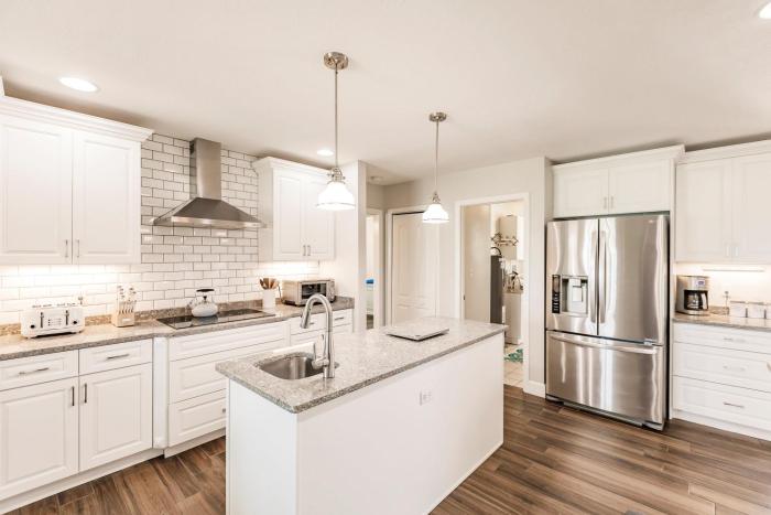 Spacious Waterfront Escape with Sun-Soaked Pool and Dock