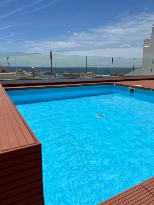 Zona centrica pero tranquila con piscina y fibra