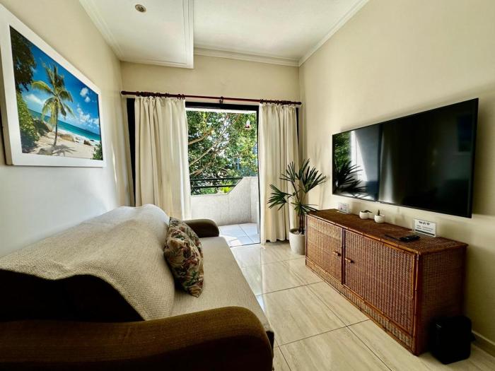 Guarujá Praia do Tombo! Ar, Piscina, Vaga, WIFI, TV Smart, perto da praia!