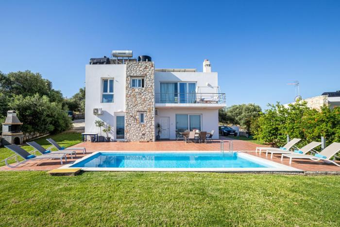 DIMITRA apartment with private pool and sea view -the ground floor of a two storey building