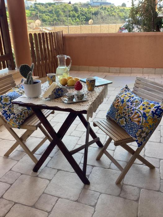 Casa vacanze iusu - House with terrace near the sea