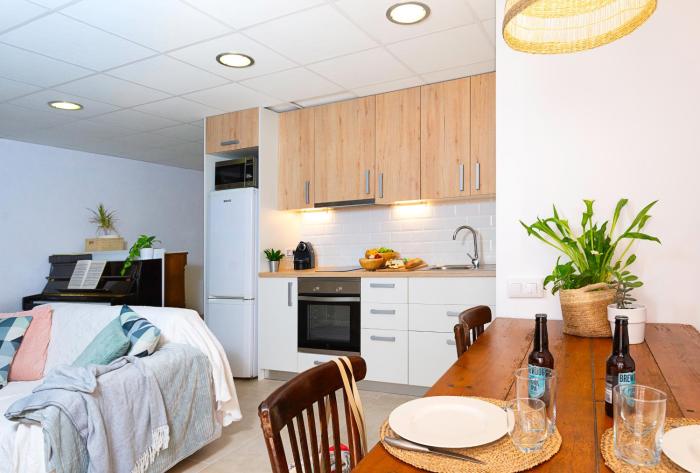 La flama del Ter, un loft preciós amb pati privat i estufa de flames