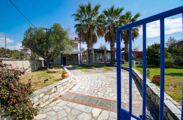 Cycladic stone house by the sea