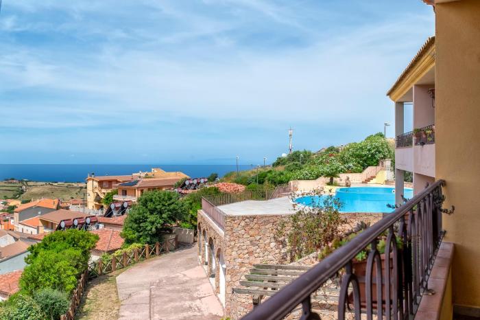 Appartamento con piscina 13