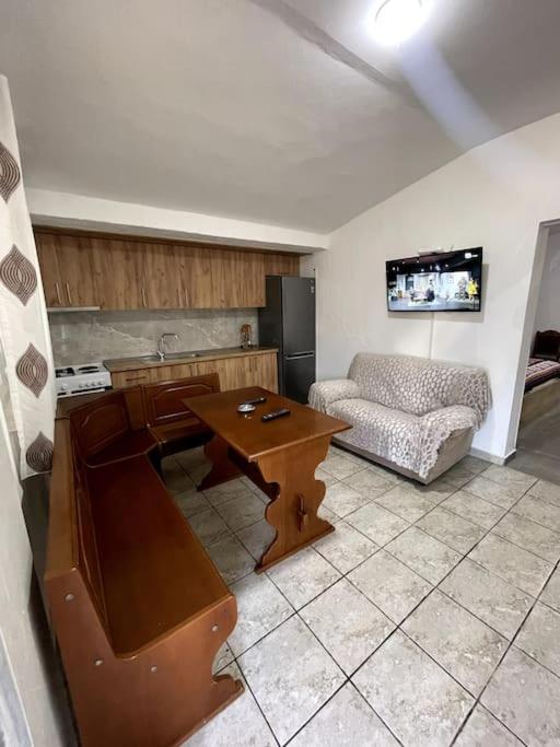 Cozy 5-Bed Home with Balcony