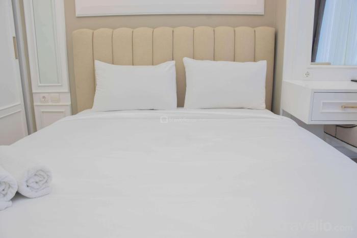 Modern and Comfy 2BR at Menteng Park Apartment By Travelio