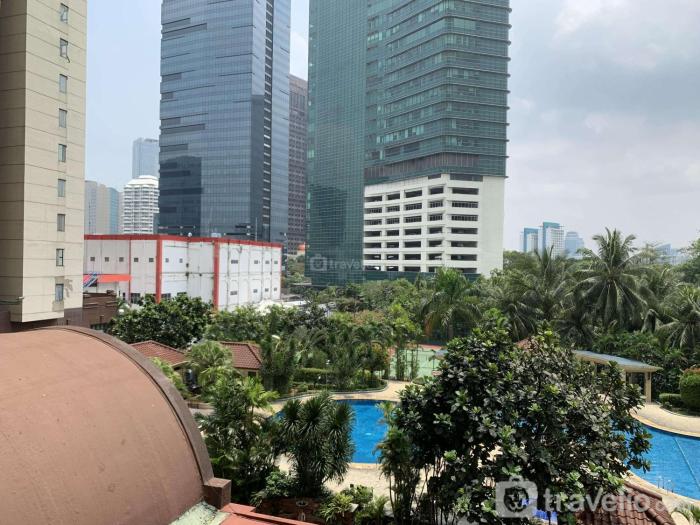 Comfy and Elegant 2BR at Sudirman Tower Condominium Apartment By Travelio