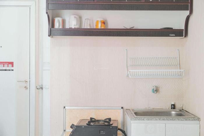 Comfy Studio Green Pramuka City Apartment near Mall By Travelio