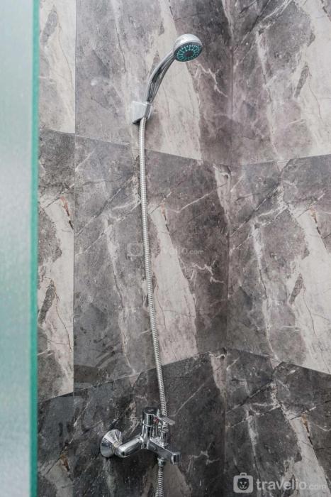 Minimalist and Cozy Studio Apartment at Tuscany Residences By Travelio