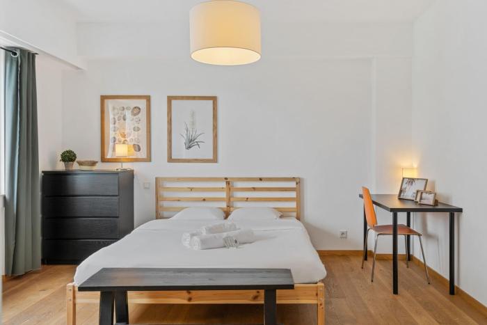 Central Lux 2BR Apt with City Views & Balcony