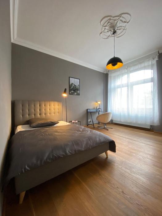 Zimmer mit Stuck in -Living Apartment Liebig54