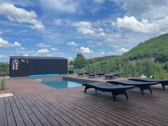 Apartamentai Monciškėse su šildomu baseinu ir terasa