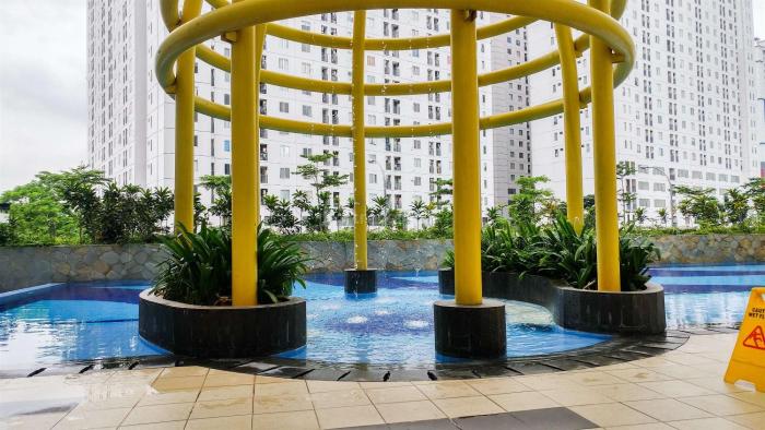 Cozy 2BR with Modern Design Bassura City Apartment near Mall By Travelio