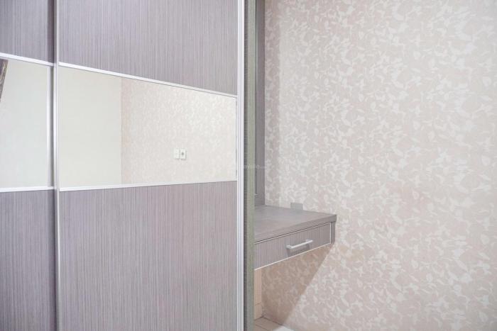 Good Deal and Relaxing 2BR Green Pramuka City Apartment By Travelio