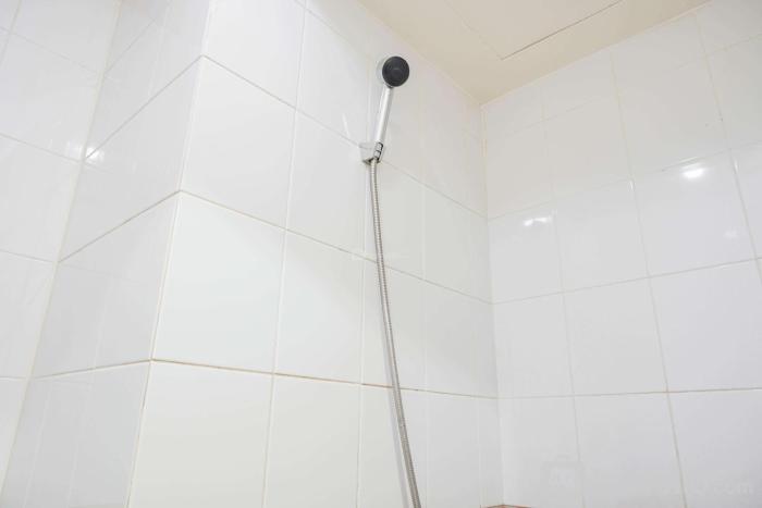 Cozy Living 2BR Green Pramuka City Apartment next to Mall By Travelio