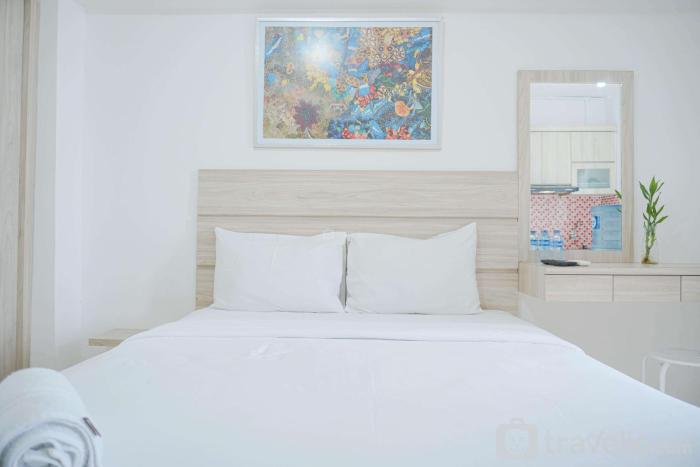 Cozy Stay and Homey Studio Apartment at Bassura City Apartment By Travelio