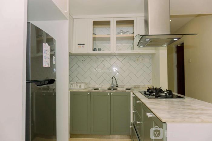 Great Deal 2BR Apartment Springhill Terrace Residence By Travelio