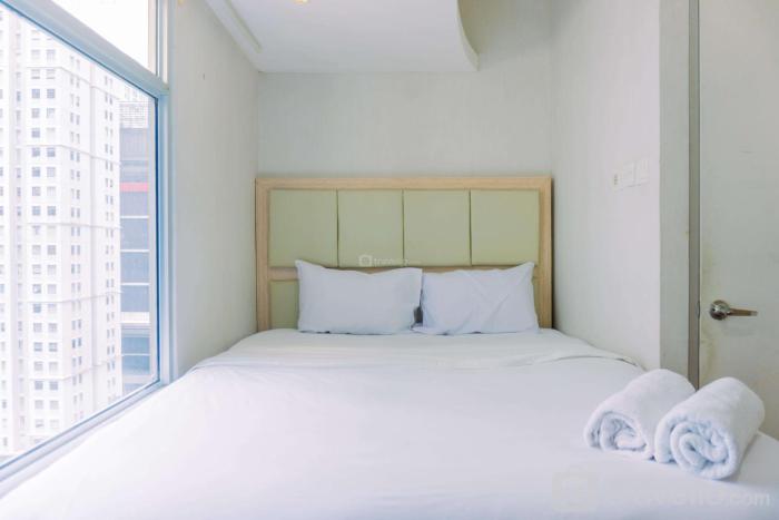 Cozy Stay and Tidy 1BR Green Bay Pluit Apartment By Travelio