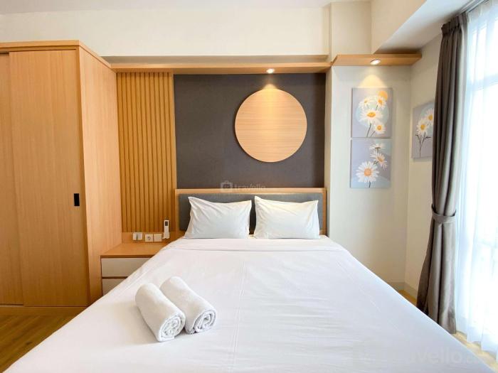 Best Homey 1BR at 52th Floor Vasanta Innopark Apartment By Travelio