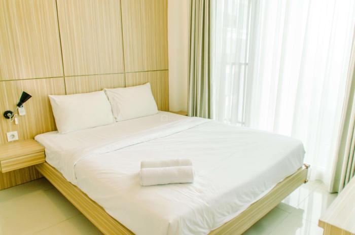 Comfort and Minimalist 1BR at Tree Park City BSD Apartment By Travelio