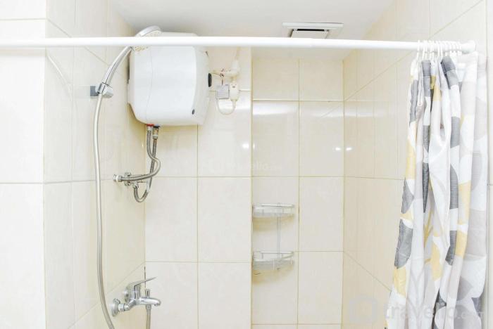 Comfort and Homey 2BR at Springlake Apartment Bekasi By Travelio