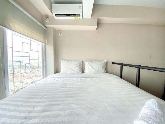 Luxury and Minimalist Studio at Patraland Urbano Apartment By Travelio