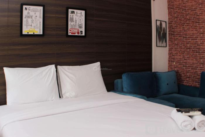 Cozy Stay and Tranquil Studio Patraland Urbano Apartment By Travelio