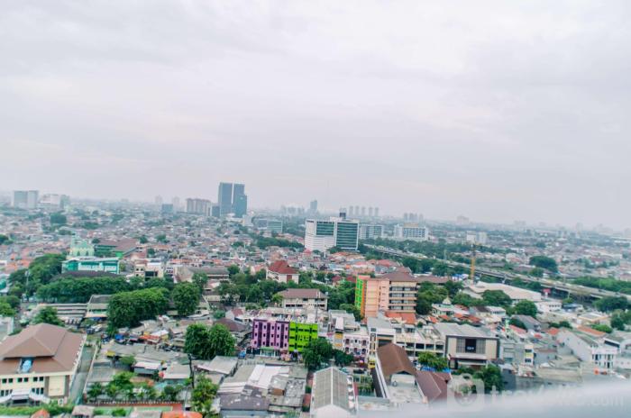 Comfort and Simply 2BR at Green Pramuka City Apartment By Travelio