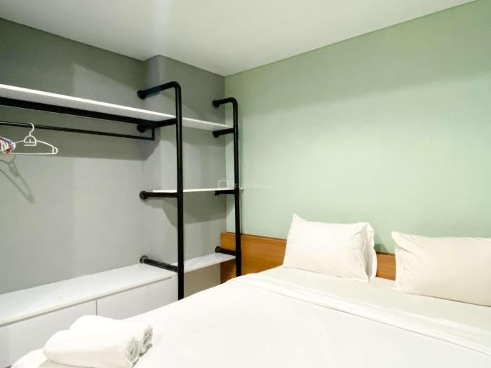 Modern and Nice 2BR at Patraland Urbano Apartment By Travelio