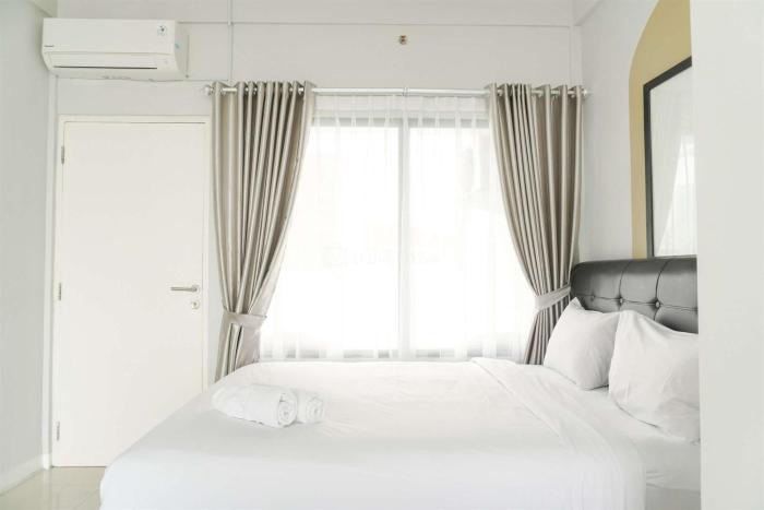 Studio Loft No Kitchen Mezzanine at Kubikahomy Apartment By Travelio