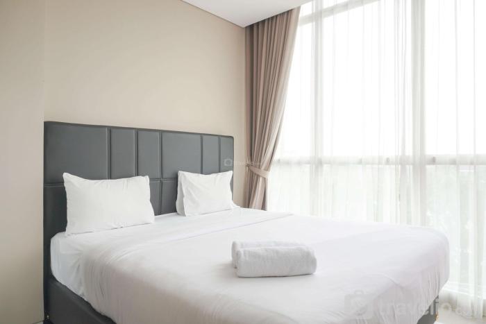 Fancy and Comfortable 1BR at Ciputra International Apartment By Travelio