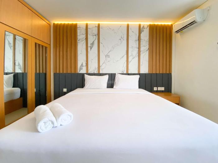 Cozy Living Studio (No Kitchen) at Sentraland Semarang Apartment By Travelio