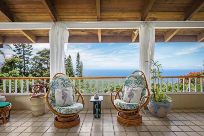 Experience ocean views at Hale Mauka, a spacious 3-bedroom retreat in Captain Cook, HI.