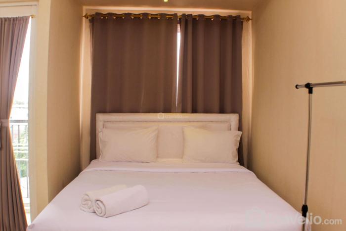 Comfort Studio Room at Oasis Cikarang Apartment By Travelio