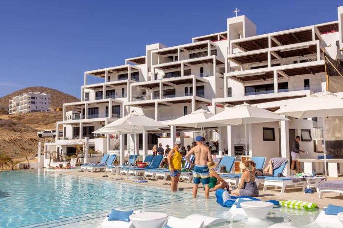 Stunning Beachfront Residence with Resort Perks