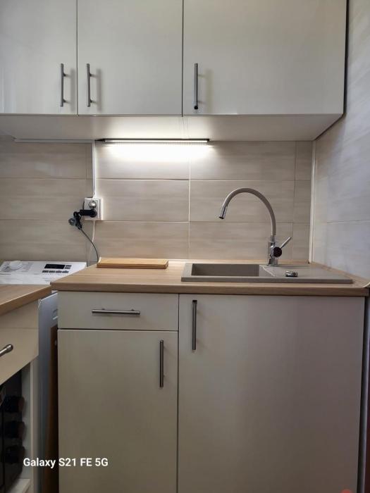 Garsoniera Auchan Titan