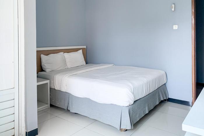 Karins Guesthouse Syariah RedPartner