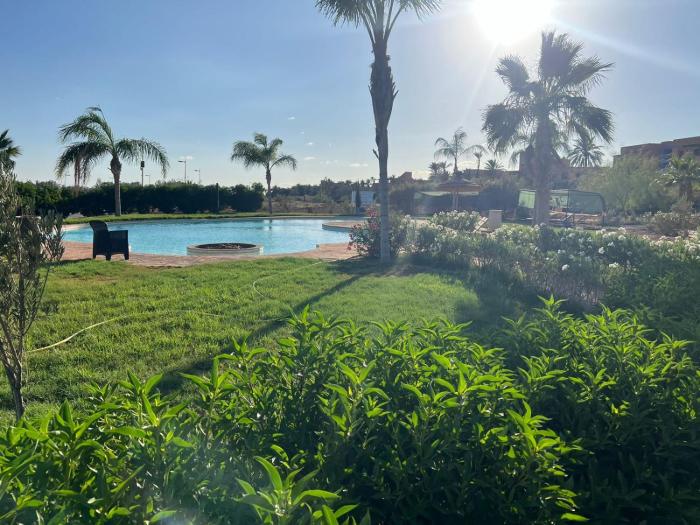 Fabuleux appartement, rez de jardin au sein de la palmeraie