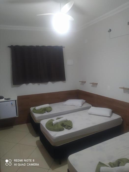 Pousada Quarto Aconchegante Suite com garagem perto da basílica