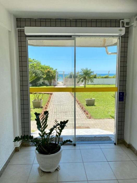 Apartamento pé na areia em Ingleses-SC