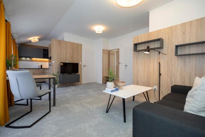 ALURE RESIDENCES 11 - 24h self check-in & private parking next to the apartment building included, CITY CENTER right on SNP Square in a quiet passage, new building, best deal in town