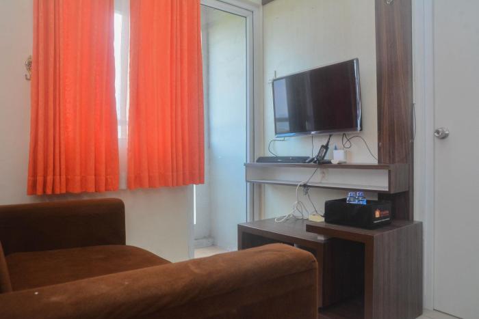 Comfy and Best Deal 2BR at Green Pramuka City Apartment By Travelio