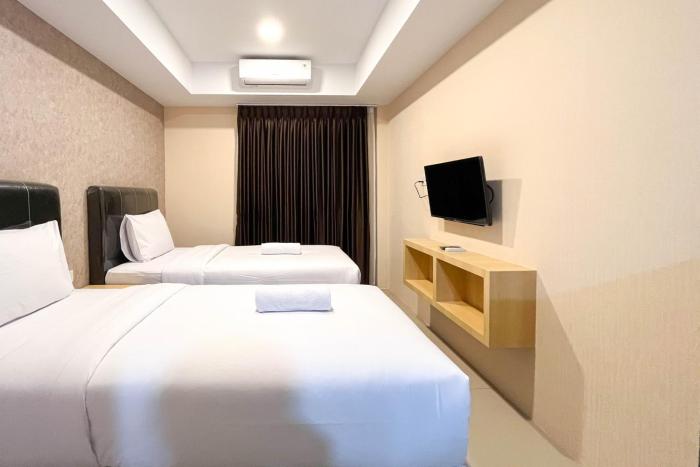 Comfy Studio Room at De Prima Apartment Medan Apartment By Travelio