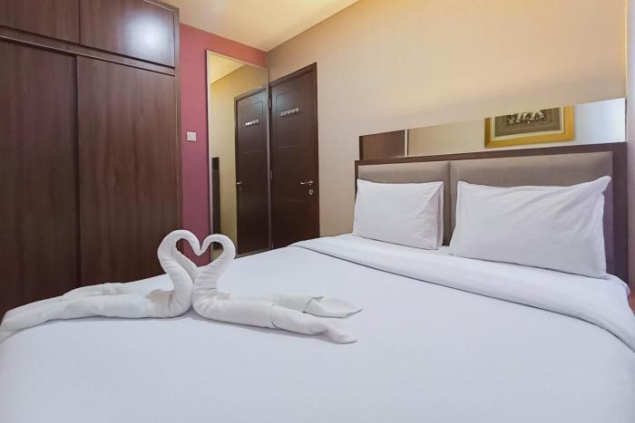 Full Furnished with Comfort Design 2BR at Vivo Apartment By Travelio