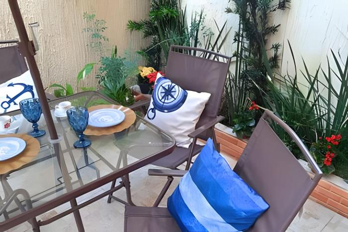 Studio pé na areia com área de churrasco privativa