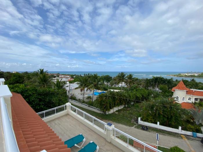 2 BR & 1WR Suite at Villa Costa Verde near Playa Cofresi, Puerto Plata with a pool, balcony, and a rooftop terrace